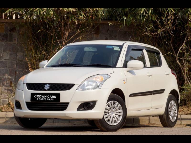 Maruti Suzuki Swift LXi ( Optional )